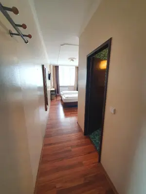 Ein Bett oder Betten in einem Zimmer der Unterkunft R&B Hotel