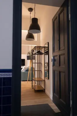 Ein Bett oder Betten in einem Zimmer der Unterkunft The Weinert Suites