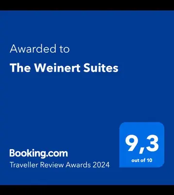 Ein Zertifikat, Auszeichnung, Logo oder anderes Dokument, das in der Unterkunft The Weinert Suites ausgestellt ist