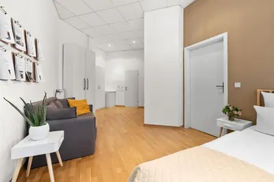 Ein Bett oder Betten in einem Zimmer der Unterkunft Holiday 33 Apartment J Prenzlauerberg