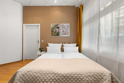 Ein Bett oder Betten in einem Zimmer der Unterkunft Holiday 33 Apartment J Prenzlauerberg