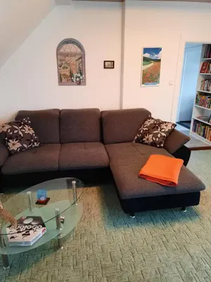 Ein Sitzbereich in der Unterkunft Ferienwohnung Gartenblick