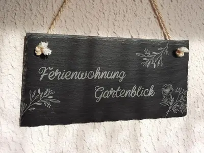 Ein Zertifikat, Auszeichnung, Logo oder anderes Dokument, das in der Unterkunft Ferienwohnung Gartenblick ausgestellt ist