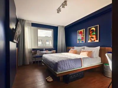 Ein Bett oder Betten in einem Zimmer der Unterkunft Numa Berlin Torstrasse