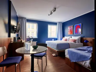 Ein Bett oder Betten in einem Zimmer der Unterkunft Numa Berlin Torstrasse