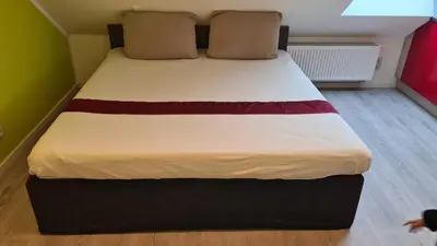 Ein Bett oder Betten in einem Zimmer der Unterkunft Helles Apartment in Berlin-Mariendorf