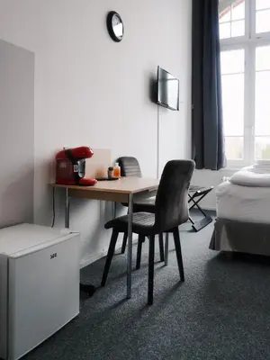 Ein Bett oder Betten in einem Zimmer der Unterkunft Motel Home Wittenau