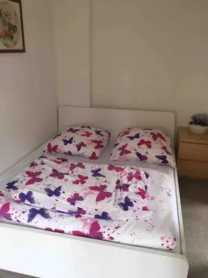 Ein Bett oder Betten in einem Zimmer der Unterkunft Bungalow Teltow Seehof