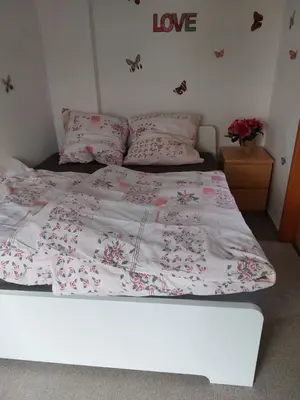 Ein Bett oder Betten in einem Zimmer der Unterkunft Bungalow Teltow Seehof
