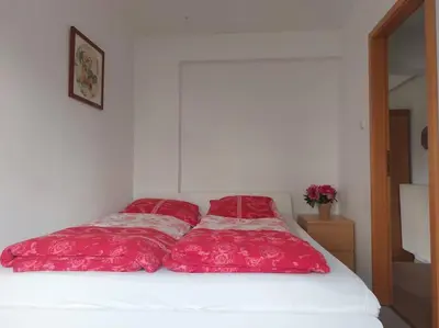 Ein Bett oder Betten in einem Zimmer der Unterkunft Bungalow Teltow Seehof
