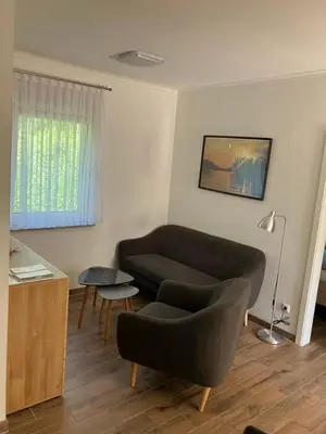 Ein Sitzbereich in der Unterkunft Havelstern Ketzin, Ferienhaus Zander