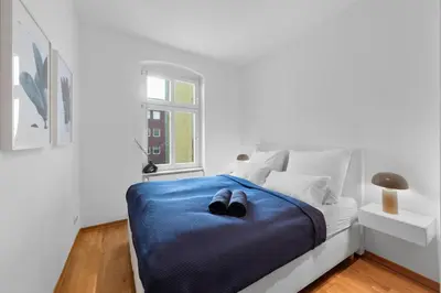 Ein Bett oder Betten in einem Zimmer der Unterkunft Beautiful 80sqm Appartment in Berlin-Mitte