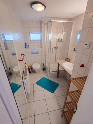 Ein Badezimmer in der Unterkunft Ferienhäuser Heideröslein