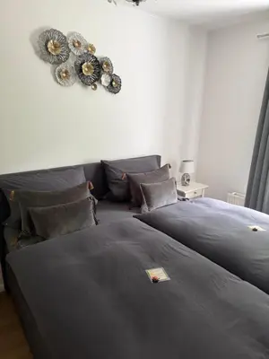 Ein Bett oder Betten in einem Zimmer der Unterkunft Luxury Apartment Amina