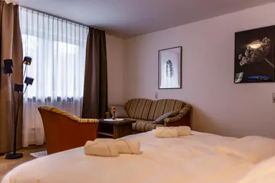 Ein Bett oder Betten in einem Zimmer der Unterkunft Motel Zur Dachsbaude