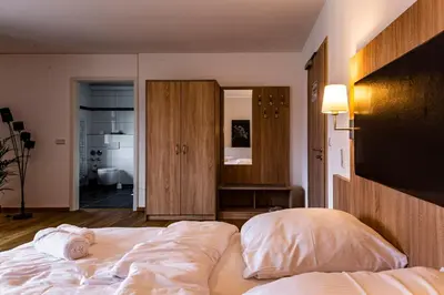 Ein Bett oder Betten in einem Zimmer der Unterkunft Motel Zur Dachsbaude