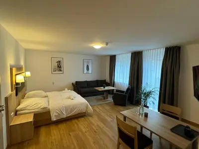 Ein Bett oder Betten in einem Zimmer der Unterkunft Motel Zur Dachsbaude