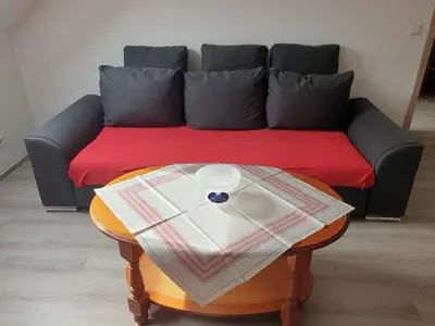 Ein Sitzbereich in der Unterkunft Ferienwohnung 6 - Gourmetzimmer