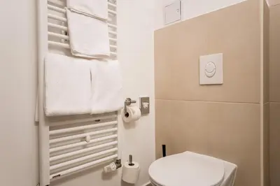 Ein Badezimmer in der Unterkunft Homaris Boxi Studios