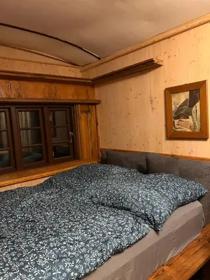 Ein Bett oder Betten in einem Zimmer der Unterkunft Haus Evelynchen auf Rädern Deutschhof
