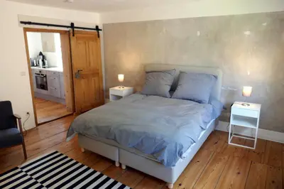 Ein Bett oder Betten in einem Zimmer der Unterkunft Roter Hirsch