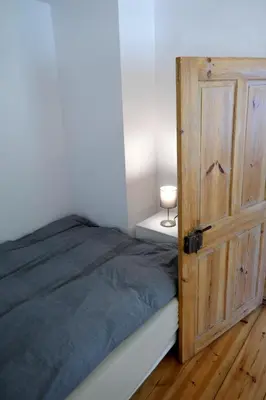 Ein Bett oder Betten in einem Zimmer der Unterkunft Roter Hirsch
