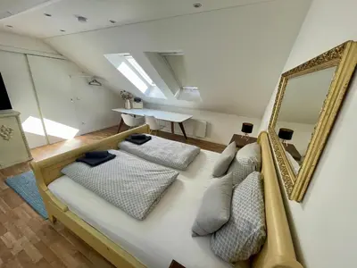 Ein Bett oder Betten in einem Zimmer der Unterkunft Westendperle am Olympiastadion