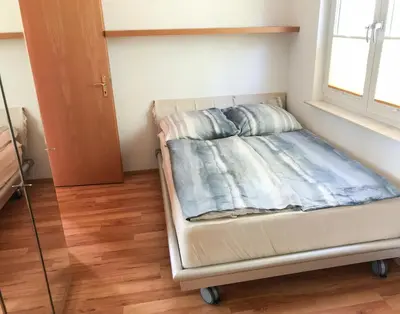 Ein Bett oder Betten in einem Zimmer der Unterkunft Ferienhaus direkt in Berlin an der Spree mit Sauna und Whirlpool
