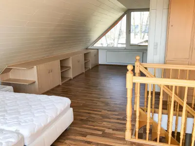 Ein Bett oder Betten in einem Zimmer der Unterkunft Ferienhaus direkt in Berlin an der Spree mit Sauna und Whirlpool
