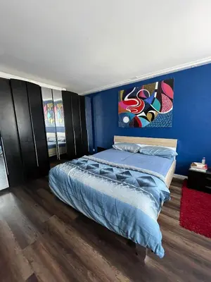Ein Bett oder Betten in einem Zimmer der Unterkunft Stadtblick Neuruppin