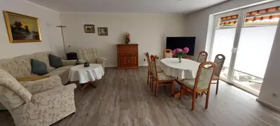 Ein Sitzbereich in der Unterkunft Haus Schiller