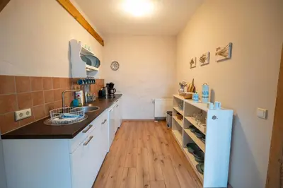 Küche/Küchenzeile in der Unterkunft Apartment am Kirchplatz 7