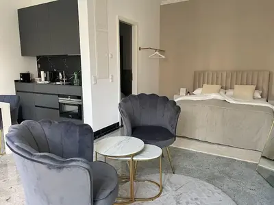 Ein Bett oder Betten in einem Zimmer der Unterkunft Luxuriöses Studio mit privatem Zugang zum See