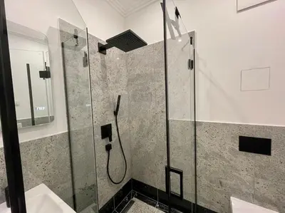 Ein Badezimmer in der Unterkunft Luxuriöses Studio mit privatem Zugang zum See