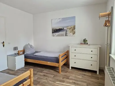 Ein Bett oder Betten in einem Zimmer der Unterkunft Ferienwohnung und Monteurwohnung Schulz