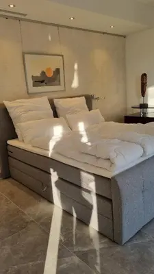 Ein Bett oder Betten in einem Zimmer der Unterkunft 70 qm großes Apartment mit für Hunde geeignetem Garten zwischen Potsdam und Berlin