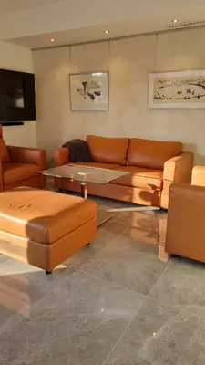 Ein Sitzbereich in der Unterkunft 70 qm großes Apartment mit für Hunde geeignetem Garten zwischen Potsdam und Berlin
