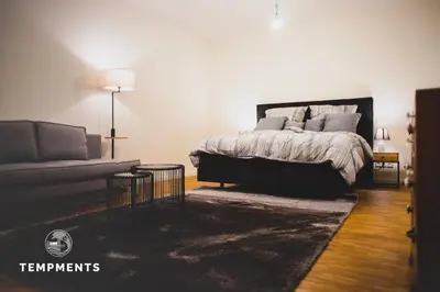 Ein Bett oder Betten in einem Zimmer der Unterkunft TempMents