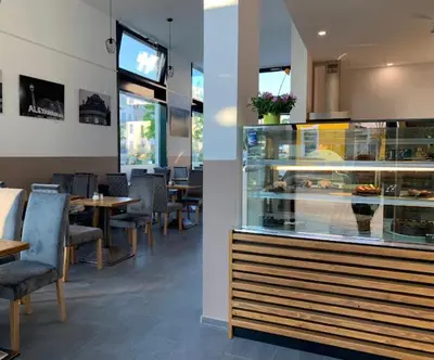 Ein Restaurant oder anderes Speiselokal in der Unterkunft TempMents