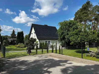 Ein Garten an der Unterkunft -Haus am Wäldchen-