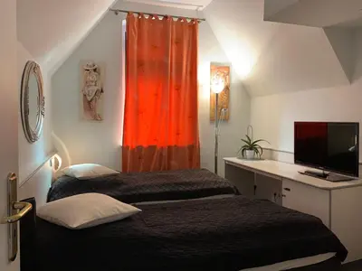 Ein Bett oder Betten in einem Zimmer der Unterkunft Hotel Blaufuchs
