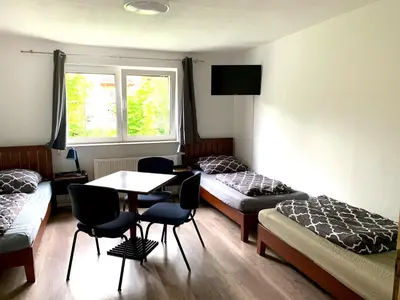 Ein Bett oder Betten in einem Zimmer der Unterkunft Monteur-Haus Linde