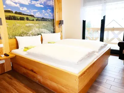 Ein Bett oder Betten in einem Zimmer der Unterkunft FeWo-Zimmer-Auszeit