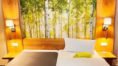 Ein Bett oder Betten in einem Zimmer der Unterkunft FeWo-Zimmer-Auszeit