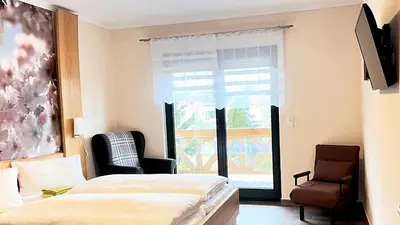 Ein Bett oder Betten in einem Zimmer der Unterkunft FeWo-Zimmer-Auszeit