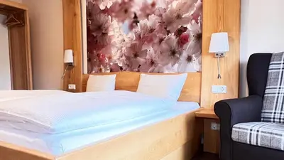Ein Bett oder Betten in einem Zimmer der Unterkunft FeWo-Zimmer-Auszeit