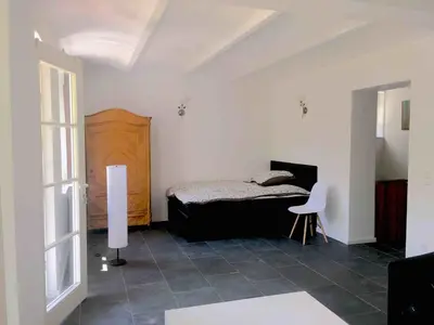 Ein Bett oder Betten in einem Zimmer der Unterkunft Ferienwohnung mit Sauna am Buckowsee