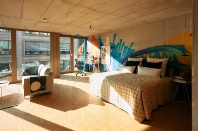Ein Bett oder Betten in einem Zimmer der Unterkunft NG19. YOUR INSPIRING HOMEBASE.