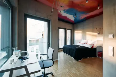 Ein Bett oder Betten in einem Zimmer der Unterkunft NG19. YOUR INSPIRING HOMEBASE.