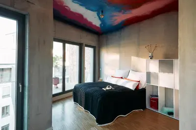 Ein Bett oder Betten in einem Zimmer der Unterkunft NG19. YOUR INSPIRING HOMEBASE.